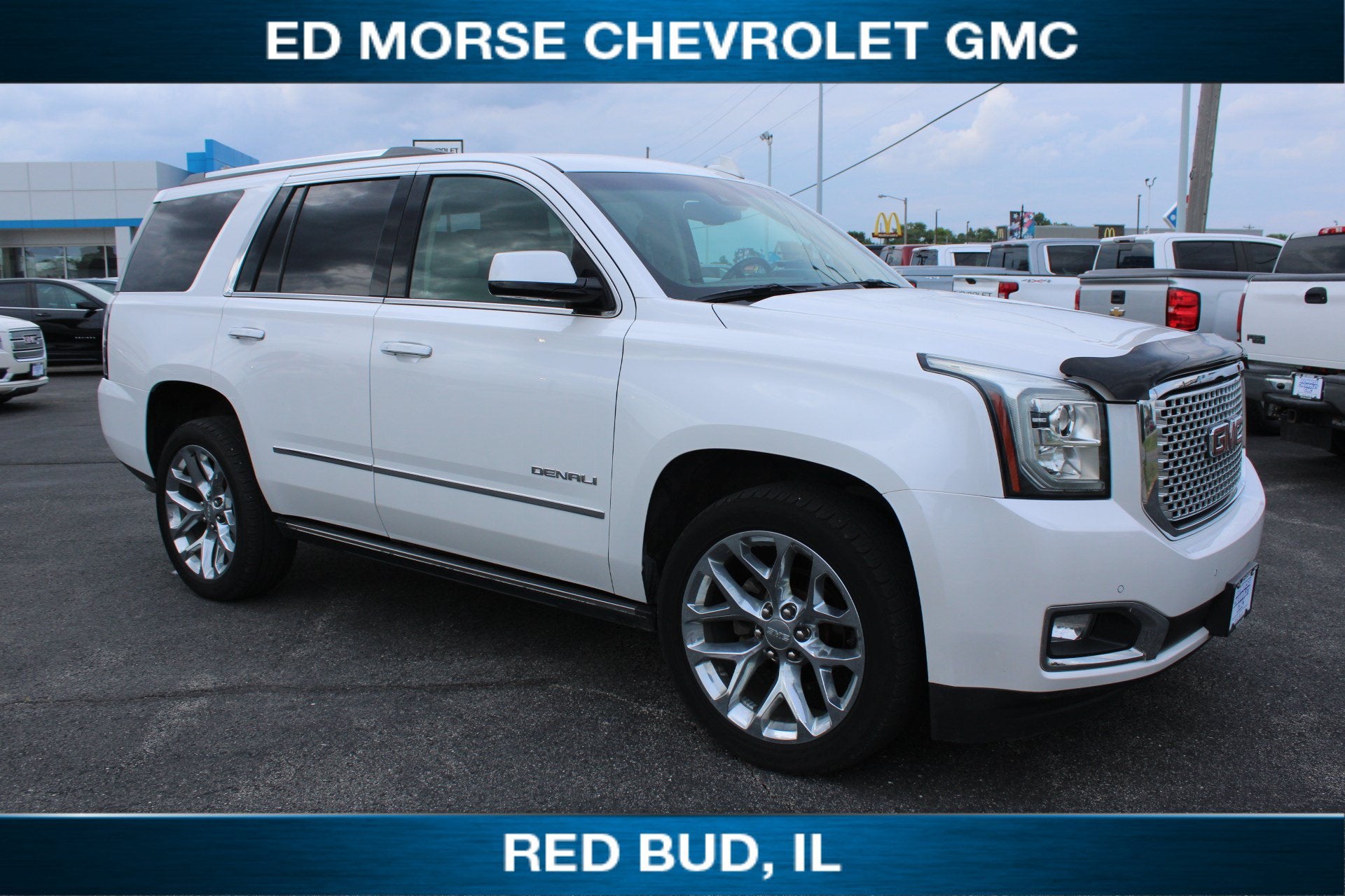 2016 GMC Yukon Denali in White Frost Tricoat — front three-quarter view