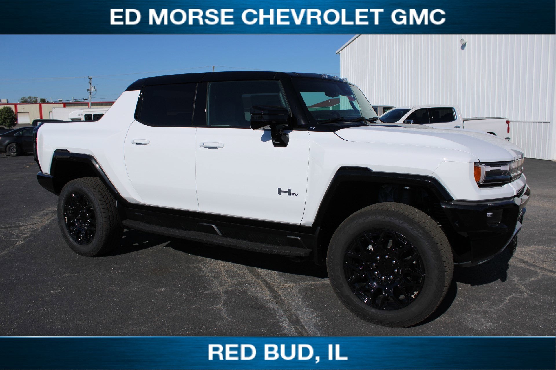 2026 GMC HUMMER EV Pickup 2X in Interstellar White — front three-quarter view