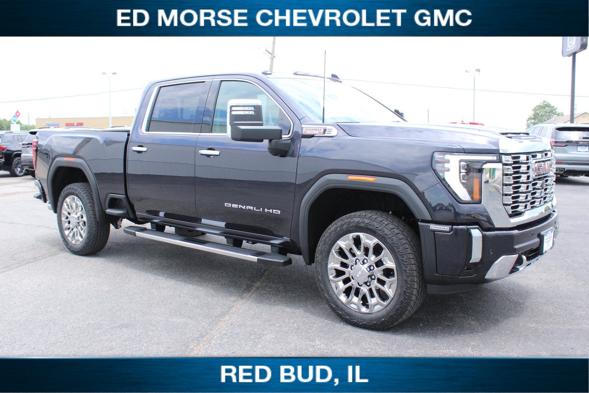 2026 GMC Sierra 2500 HD Denali in Titanium Rush Metallic — front three-quarter view