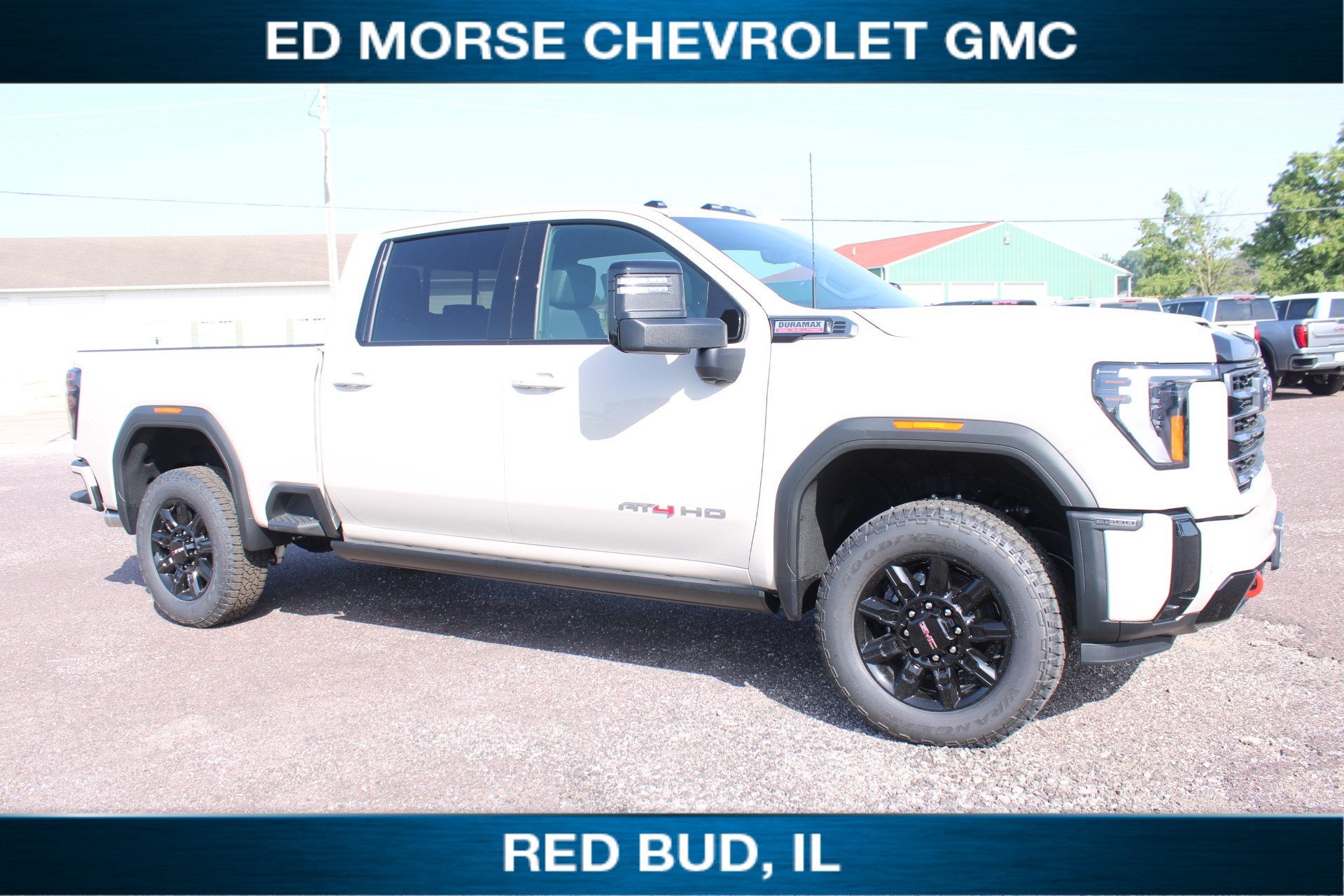 2026 GMC Sierra 3500 HD AT4 in Coastal Dune — front three-quarter view