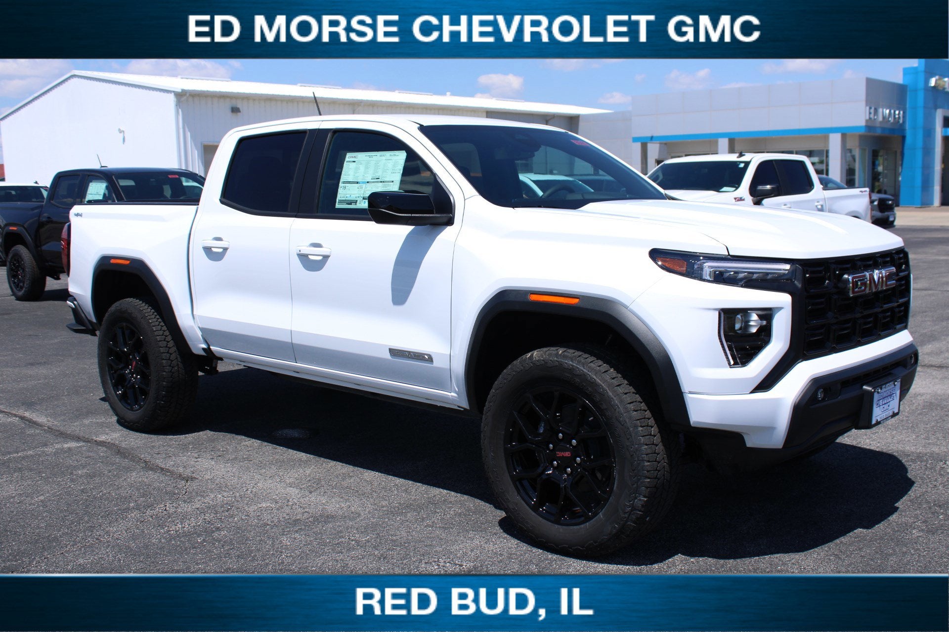 2026 GMC Canyon Elevation in Summit White — front three-quarter view
