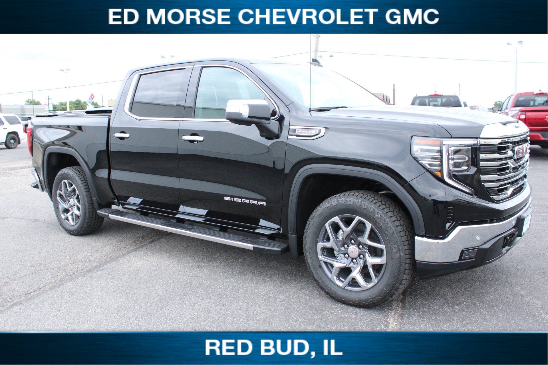 2026 GMC Sierra 1500 SLT in Onyx Black — front three-quarter view